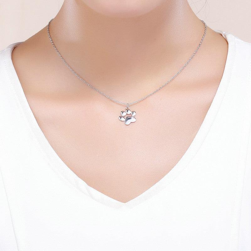 Teeny Tiny Paw Necklace - Delicate paw print pendant necklace, perfect for animal lovers.