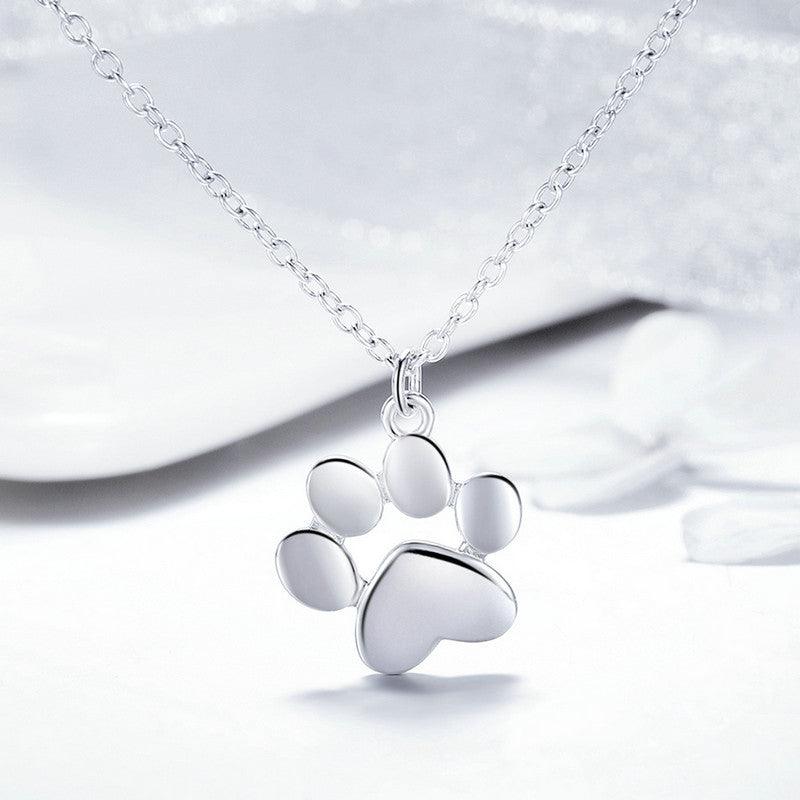 Teeny Tiny Paw Necklace - Delicate paw print pendant necklace, perfect for animal lovers.