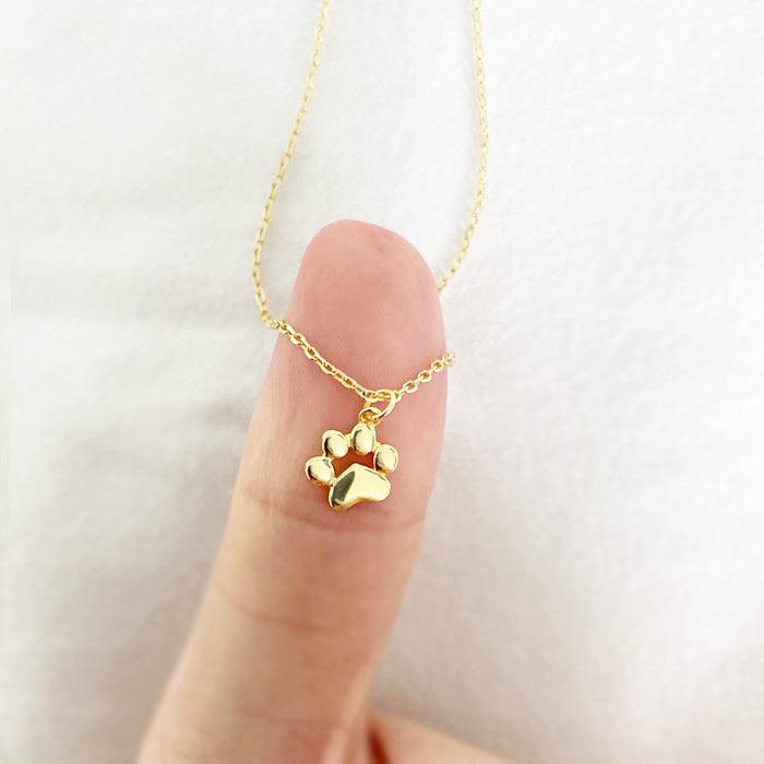 Teeny Tiny Paw Necklace - Delicate paw print pendant necklace, perfect for animal lovers.